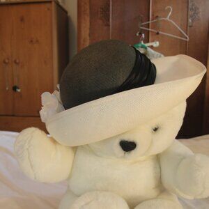 Hat, black and white with white flowers. Sz. 7 - 7.5. Miss Bierner brand. Good.